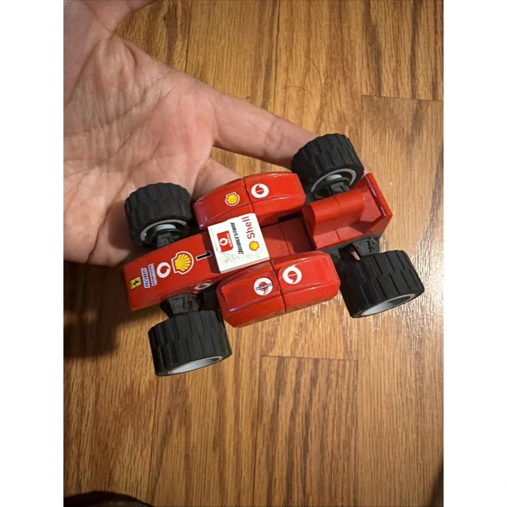 Red Lego Ferrari Bridgestone Shell Four-Wheel Car